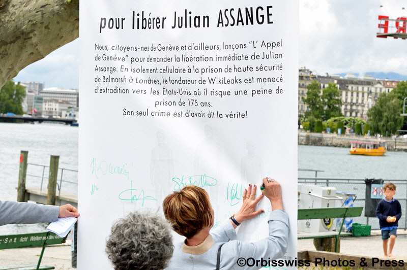 he Honorable Mayor of Geneva, Frédérique Perler, signing the "Assange Appel de Genève"